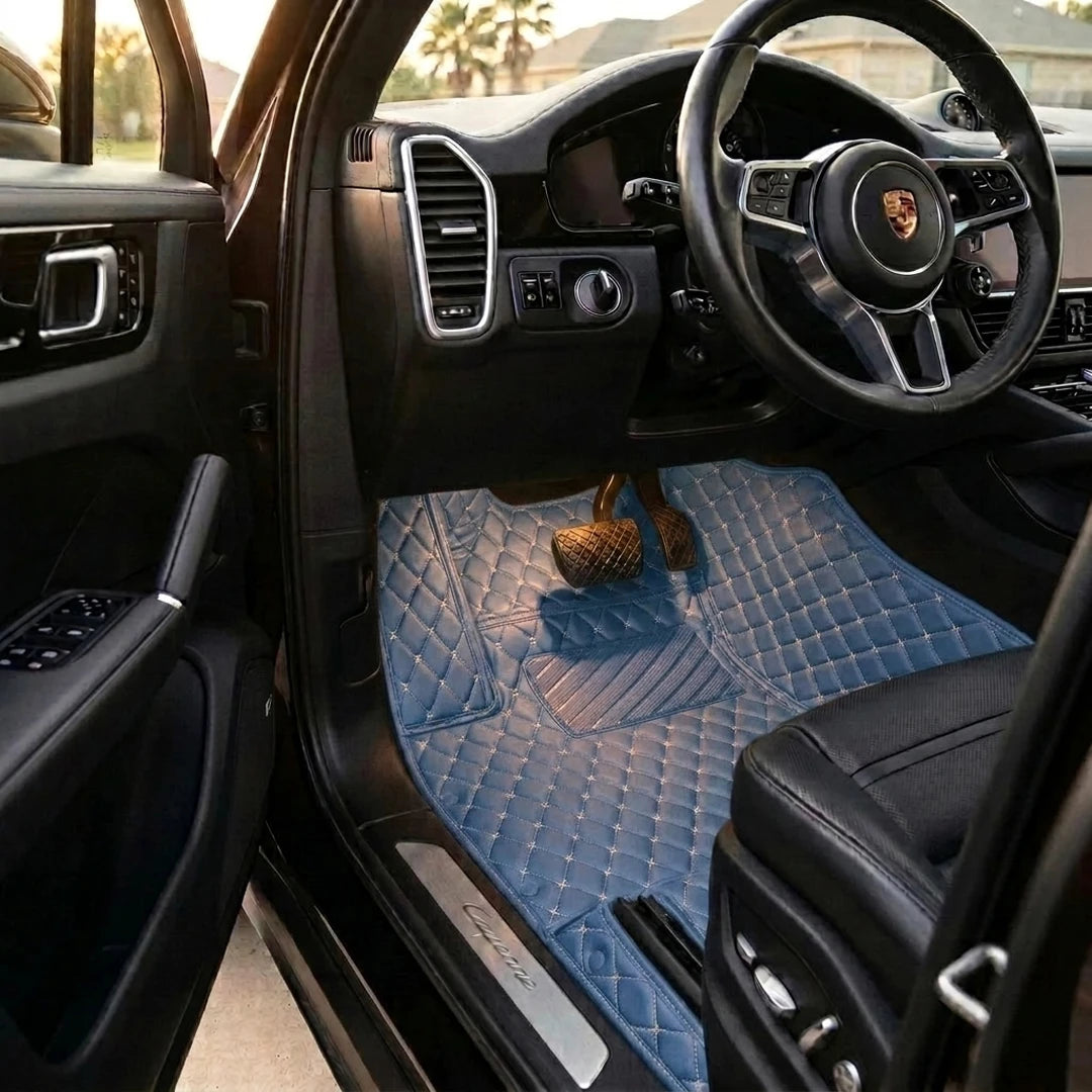 Matrikar Diamond Series custom fit car mats in Vintage Blue fitted in a Porsche Cayenne driver footwell