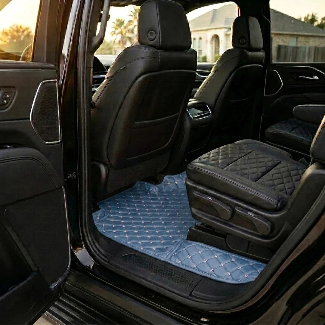 Matrikar Diamond Series custom fit car mats in Vintage Blue fitted in the rear row of a Cadillac Escalade