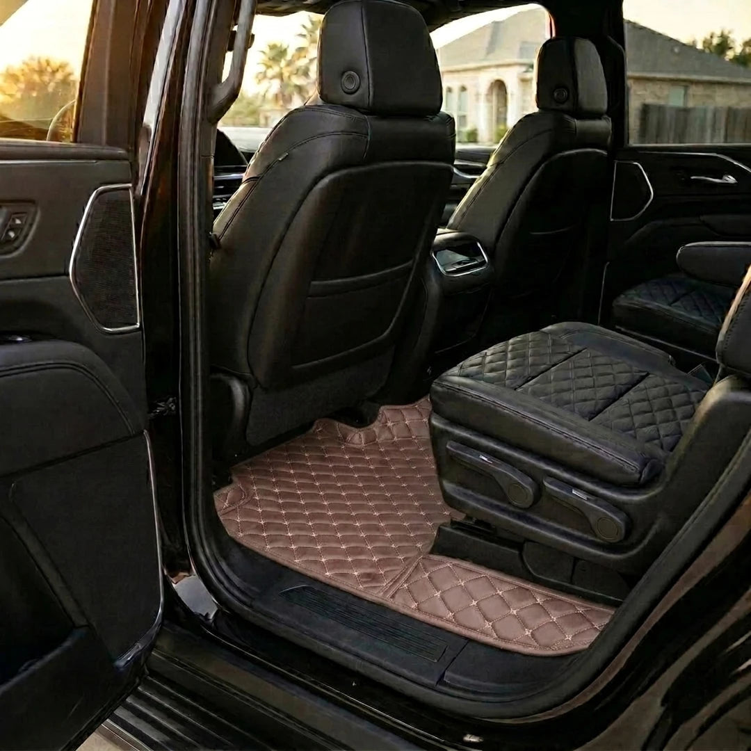 Matrikar Diamond Series custom fit car mats in Chocolate Brown fitted in the rear row of a Cadillac Escalade