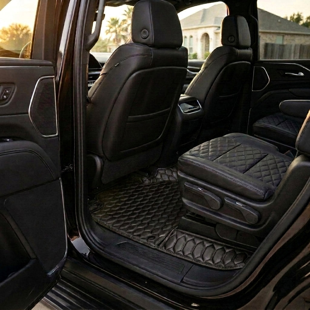 Matrikar Hexa Series custom fit car mats in All Black fitted in the rear row of a Cadillac Escalade