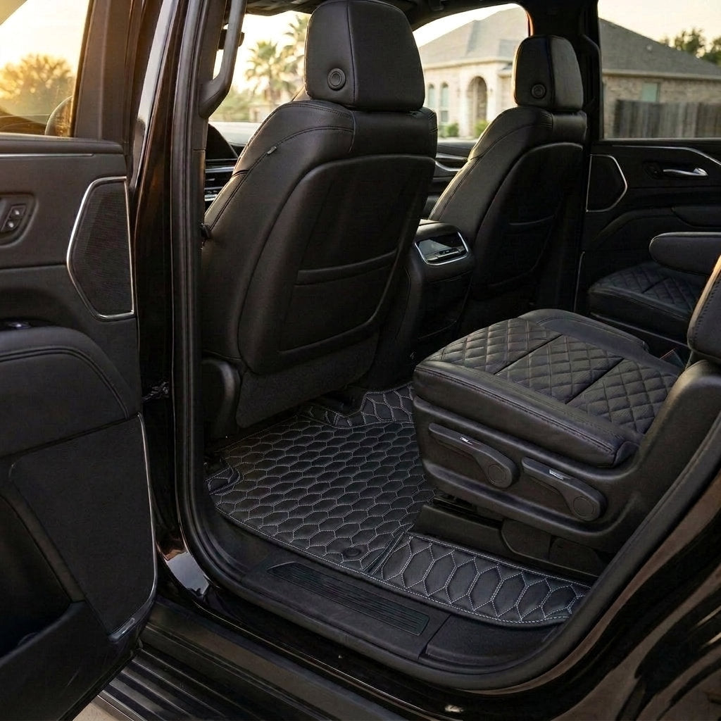 Matrikar Hexa Series custom fit car mats in Black with White Stitching fitted in the rear row of a Cadillac Escalade
