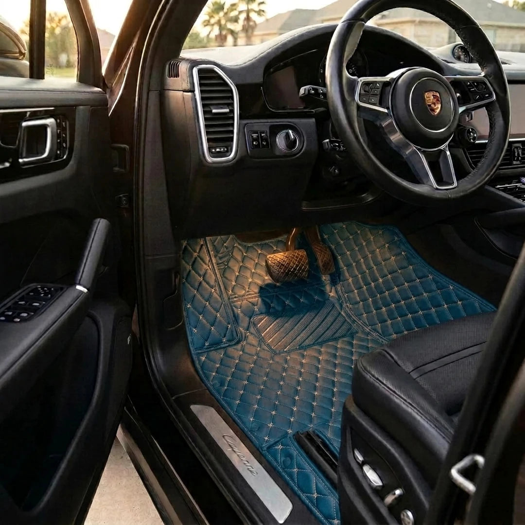 Matrikar Diamond Series custom fit car mats in Vintage Blue fitted in a Porsche Cayenne driver footwell