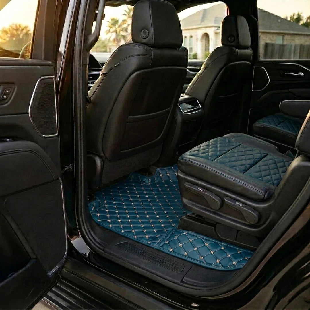 Matrikar Diamond Series custom fit car mats in Vintage Blue fitted in the rear row of a Cadillac Escalade
