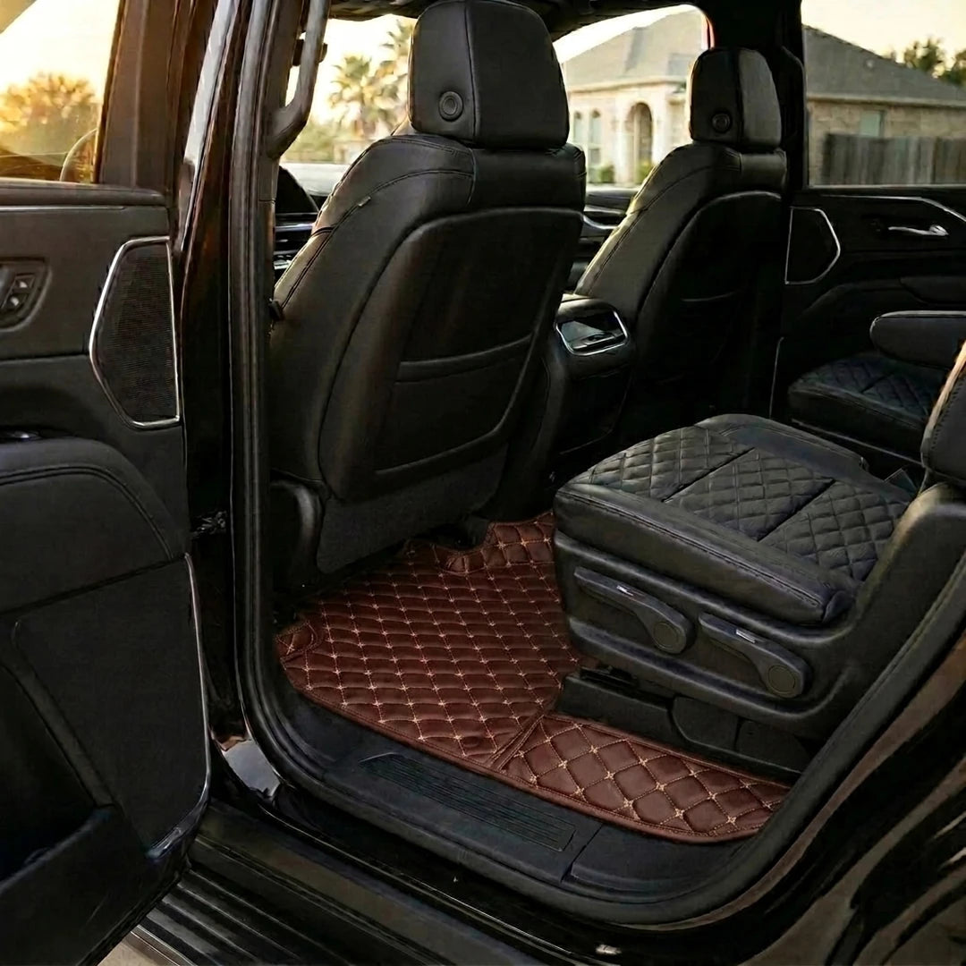 Matrikar Diamond Series custom fit car mats in Chocolate Brown fitted in the rear row of a Cadillac Escalade