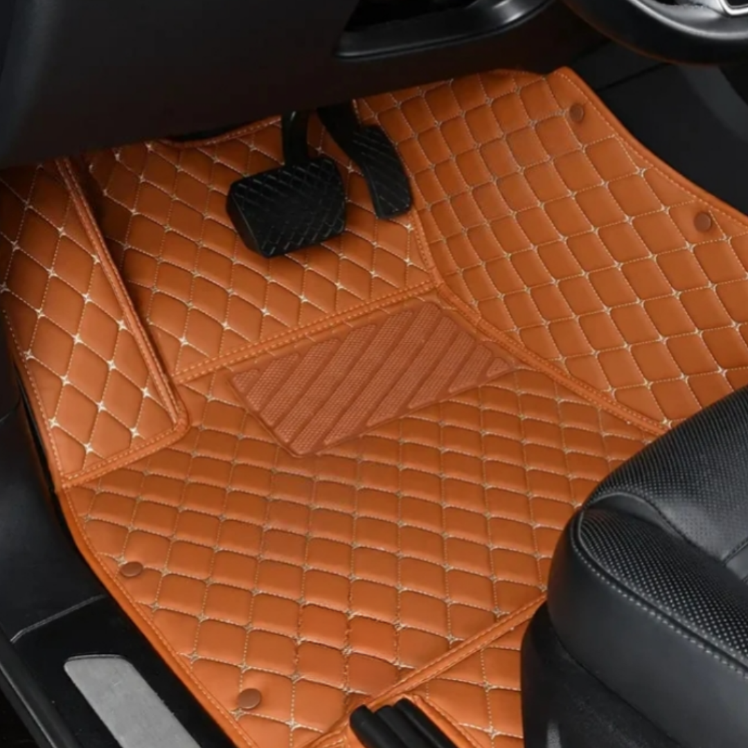 Matrikar Diamond Series custom fit car mat in Caramel Brown, installed in a driver footwell