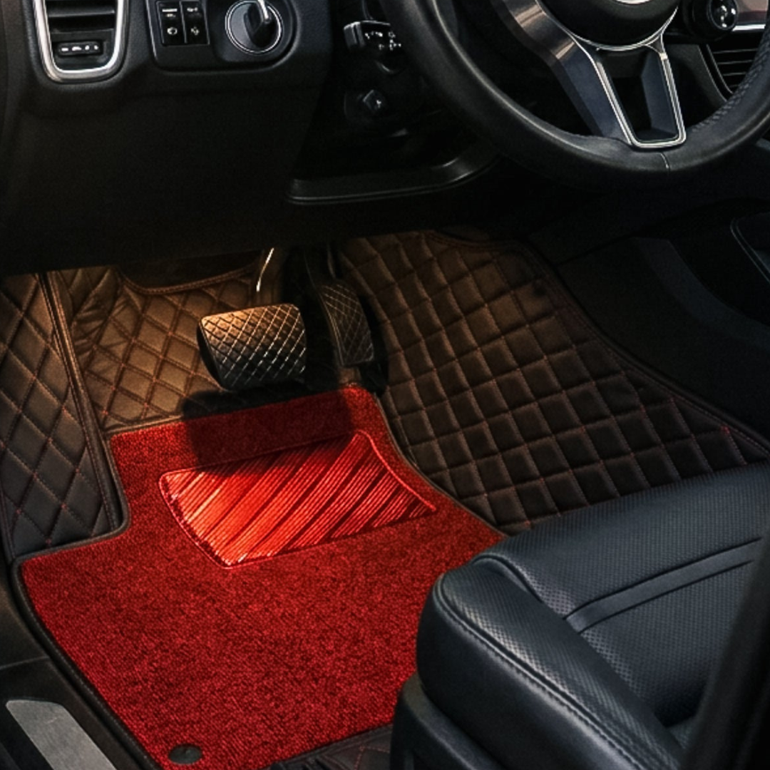 Matrikar Dual-Layer Series custom fit car mat in Black with red stitching and a red top carpet, installed in a driver footwell