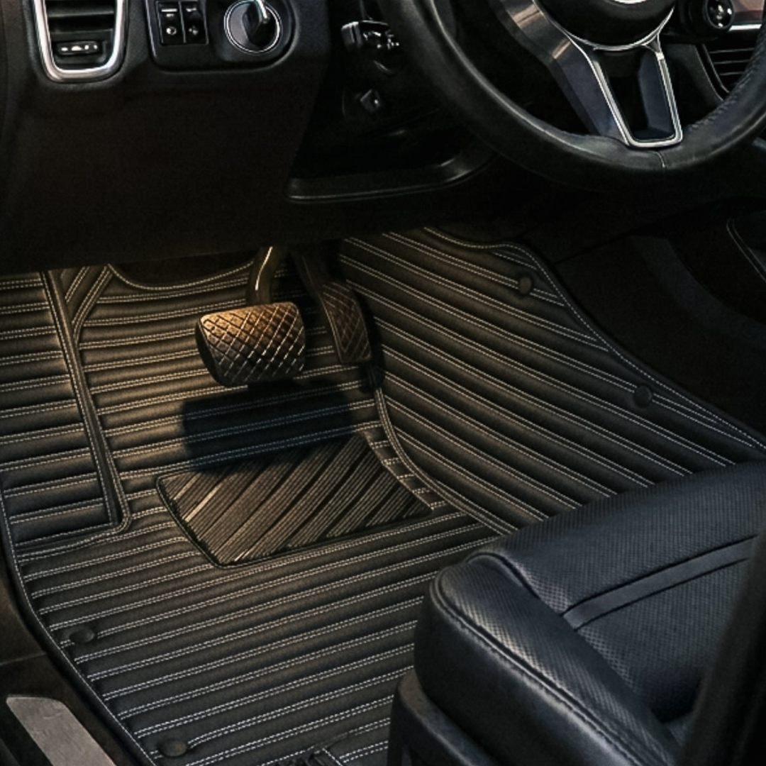 Matrikar Ribbed Series custom fit car mat in Black & White, installed in a driver footwell